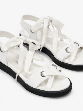 Elegant Cream Sandals with Black Soles